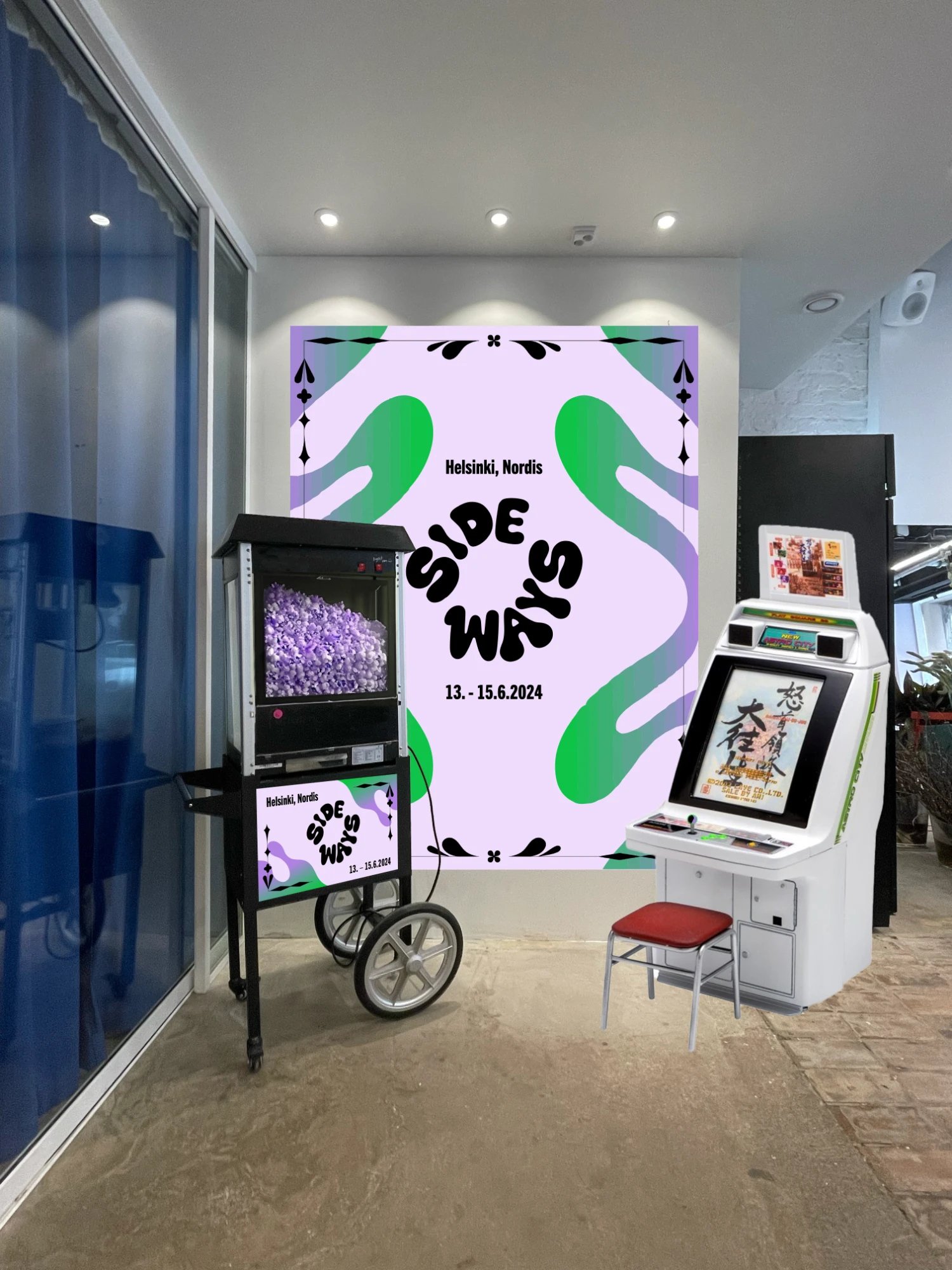 Sideways event with a popcorn machine and arcade games