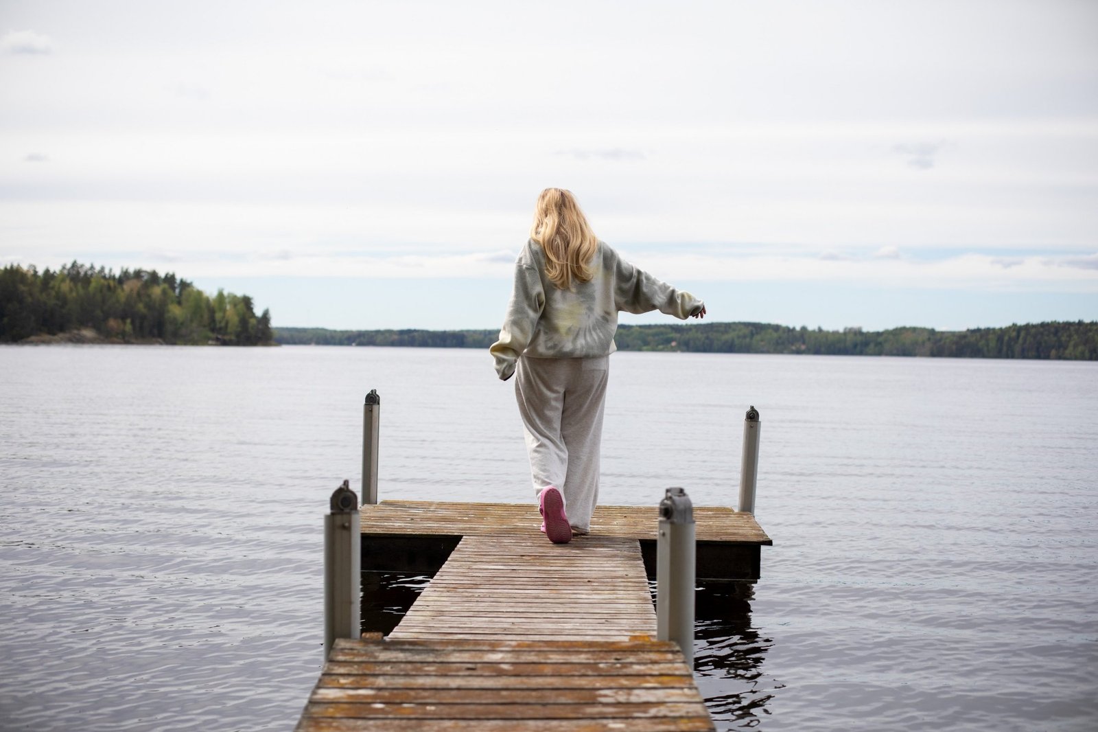 Photo, person on a dock